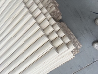 Panneau MDF rainuré recouvert de PVC, panneau en fibres imperméable avec rainures verticales pour applications décoratives intérieures de cuisine et de salle de bain