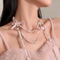 Collier élégant à nœud papillon à pois, double rang de perles, chaîne de pull mignonne, ras-de-cou de fête, chaîne de clavicule de luxe