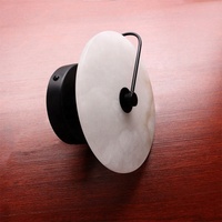 Luminaire moderne en métal noir décoratif rond en albâtre espagnol Albâtre Applique murale éclairage pour hôtel