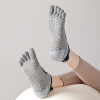 Ensemble de chaussettes de yoga et de pilates antidérapantes à cinq doigts, de couleur unie, pour femmes, avec des caractéristiques écologiques et respirantes en coton