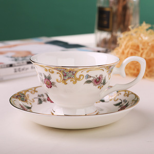 Taza de Té y Platillo de Porcelana Fina con Diseño Floral de <span class=keywords><strong>Magnolia</strong></span>, Estilo Británico con Borde Dorado, Taza de <span class=keywords><strong>Café</strong></span> de Porcelana con Logotipo Personalizado para Regalo de Té de la Tarde - Product Image 1