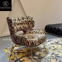 Fauteuil individuel de loisirs en tissu de luxe léger de style italien, design moderne pour salon, fauteuil à dossier, fauteuil de loisirs à imprimé léopard pour villa