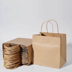 Imballaggio personalizzato del sacchetto di carta di acquisto di modo di Logo con il sacchetto di carta del regalo di Kraft marrone della maniglia