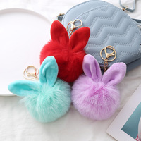 Porte-clés Pompon en fourrure avec oreilles de lapin mignonnes, boule de pompons moelleuse, porte-clés pour filles et femmes, porte-clés en peluche, breloque de sac en peluche avec oreilles de lapin