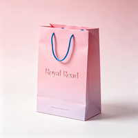 Sacs shopping en papier noir de luxe en gros, sacs cadeaux en papier personnalisés avec logo imprimé et poignée en corde pour l'emballage de vêtements en détail