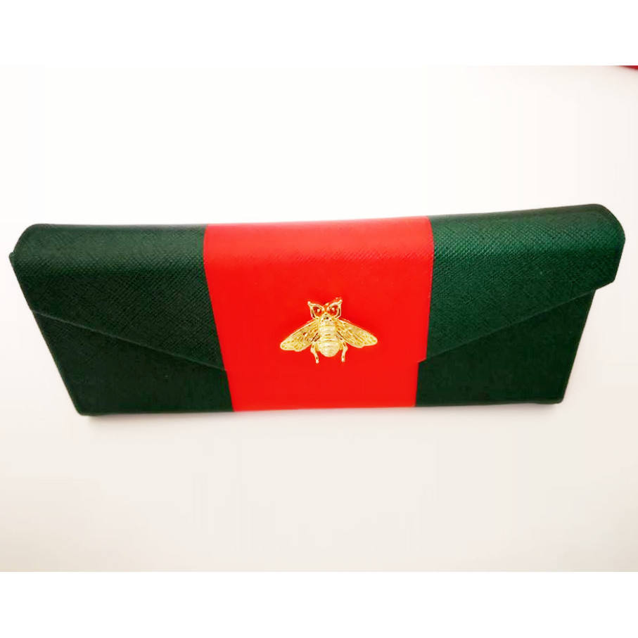 Design d'abeille rouge et verte à la mode