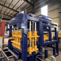 Machine hydraulique entièrement automatique à haute production QT7-15 pour la fabrication de briques creuses et de pavés