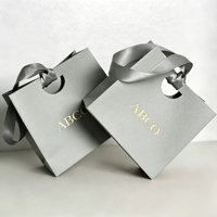 Sacs en papier personnalisés de luxe verts pour cosmétiques, vêtements et emballages