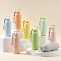 Bouteille isotherme classique en acier inoxydable à double paroi 600 ml, écologique, avec couvercle à bouton et poignée rabattable, maintien au chaud 12-24 heures