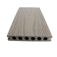 Revêtement de sol extérieur imperméable Co-extrudé creux solide résistant aux rayures de terrasse en WPC ignifuge pour jardin Patio longue durée de vie