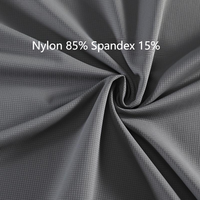 Kaus kerah O spandeks 85% nilon 170gsm 15% kaus lari longgar lembut nyaman Logo kustom.