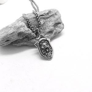 Yunnique – collier avec pendentif bouclier de loup unisexe en acier inoxydable, bijoux de style minimaliste pour hommes et femmes, accessoire de mode - Product Image 4