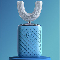 Brosse à dents électrique ultrasonique de style moderne à usage domestique Brosse à dents en forme de U pour adultes Brosse à dents de voyage blanchissante et buccale