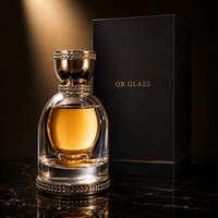 Flacons de parfum ronds en verre de luxe avec couvercle rond transparent doré 100 ml avec tête de pulvérisation à pompe avec boîte d'emballage