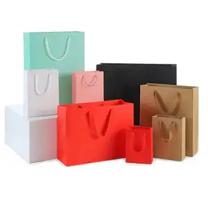 Luxury Custom Own Logo Printed Retail Clothing Packaging Paper Bag Shopping Packaging Paper Bag For Apparel