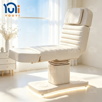 Table de massage électrique, mobilier de salon, cuir PU, structure métallique, éponge haute densité, dossier et repose-pieds réglables, lumière d'ambiance, repose-pieds