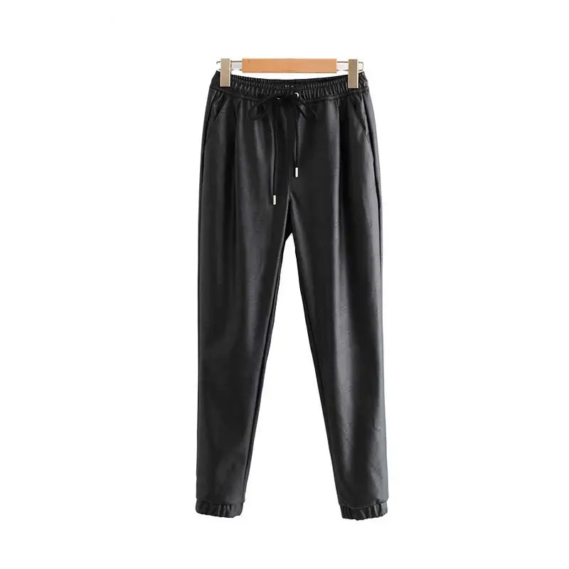 Kz870 femmes chic en cuir PU pantalon taille élastique unie cordon poches femelle de base élégant pantalon vêtements en gros