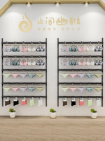 Présentoir à lingerie mural en or personnalisé avec étagère pour soutiens-gorge et sous-vêtements pour la décoration et le design de magasin