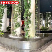 Comptoir de bar en acier inoxydable de forme spéciale, rideau d'eau, évier en acier inoxydable, table d'îlot de luxe, réception d'hôtel, restaurant, salon de beauté