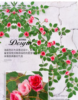 Guirlande de roses artificielles multicolores de 1,8 m avec bourgeons de roses et feuilles vertes pour la décoration florale murale suspendue de la cour, du balcon ou de l'hébergement