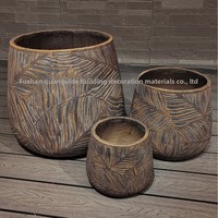 Pot de fleurs rond en ciment de style européen, grande taille, résistant à la corrosion, personnalisé en usine, pour projets hôteliers, utilisation intérieure et extérieure