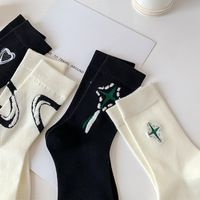 Longues chaussettes mignonnes femmes tricot coton équipage Kawaii belles dames chaussettes de créateur haut Art chaud Sokken Femme