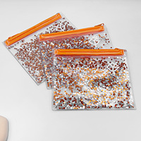 Haute qualité PVC paillettes brillant sac cosmétique étanche et à la mode avec fermeture éclair pour le stockage de maquillage clé pièce-vente en gros