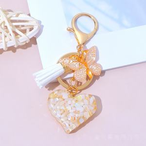 พวงกุญแจเรซิ่นรูปหัวใจคริสตัล ประดับพู่ห้อยผีเสื้อสุดหรู พวงกุญแจรูปหัวใจ จี้ห้อยกระเป๋าสำหรับ<span class=keywords><strong>สาว</strong></span>ๆ จี้ห้อยกุญแจรถ เครื่องประดั<span class=keywords><strong>บ</strong></span> - Product Image 4