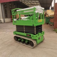Plateforme élévatrice à ciseaux sur chenilles électrique 10m à moteur à couple élevé pour applications lourdes sur chantier