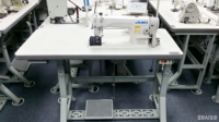 Machine à coudre industrielle à point noué à aiguille simple DDL-8700-7 d'occasion