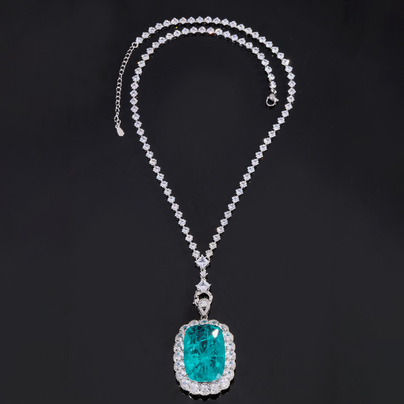 Platinum emerald pendant with wild chain