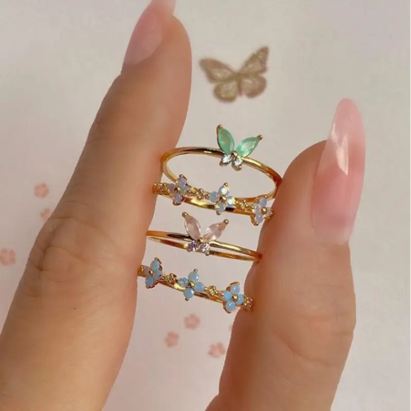गर्म बिक्री महिलाओं डिजाइन तांबा गहने जड़ा हीरा नीले फूल छोटे उंगली की अंगूठी 18K सोना मढ़वाया नवीनतम मीठा प्यारा लड़कियों के छल्ले