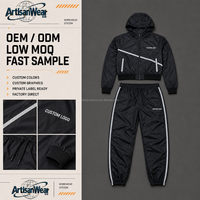 Ensemble décontracté pour homme personnalisé, sweat à capuche noir à fermeture éclair avec poches à rayures diagonales, pantalon de jogging à rayures latérales, OEM ODM