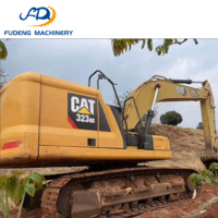 Excavatrice sur chenilles CAT 320GC d'occasion bien entretenue, 20 tonnes, avec godet de 1,1 m³ pour les travaux de pose de canalisations en construction urbaine