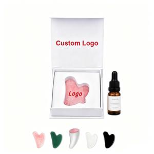Massaggiatore <span class=keywords><strong>Viso</strong></span> Gua Sha in <span class=keywords><strong>Pietra</strong></span> di Quarzo Rosa Naturale a Forma di Pollice con Logo Personalizzato e Scatola - Product Image 1