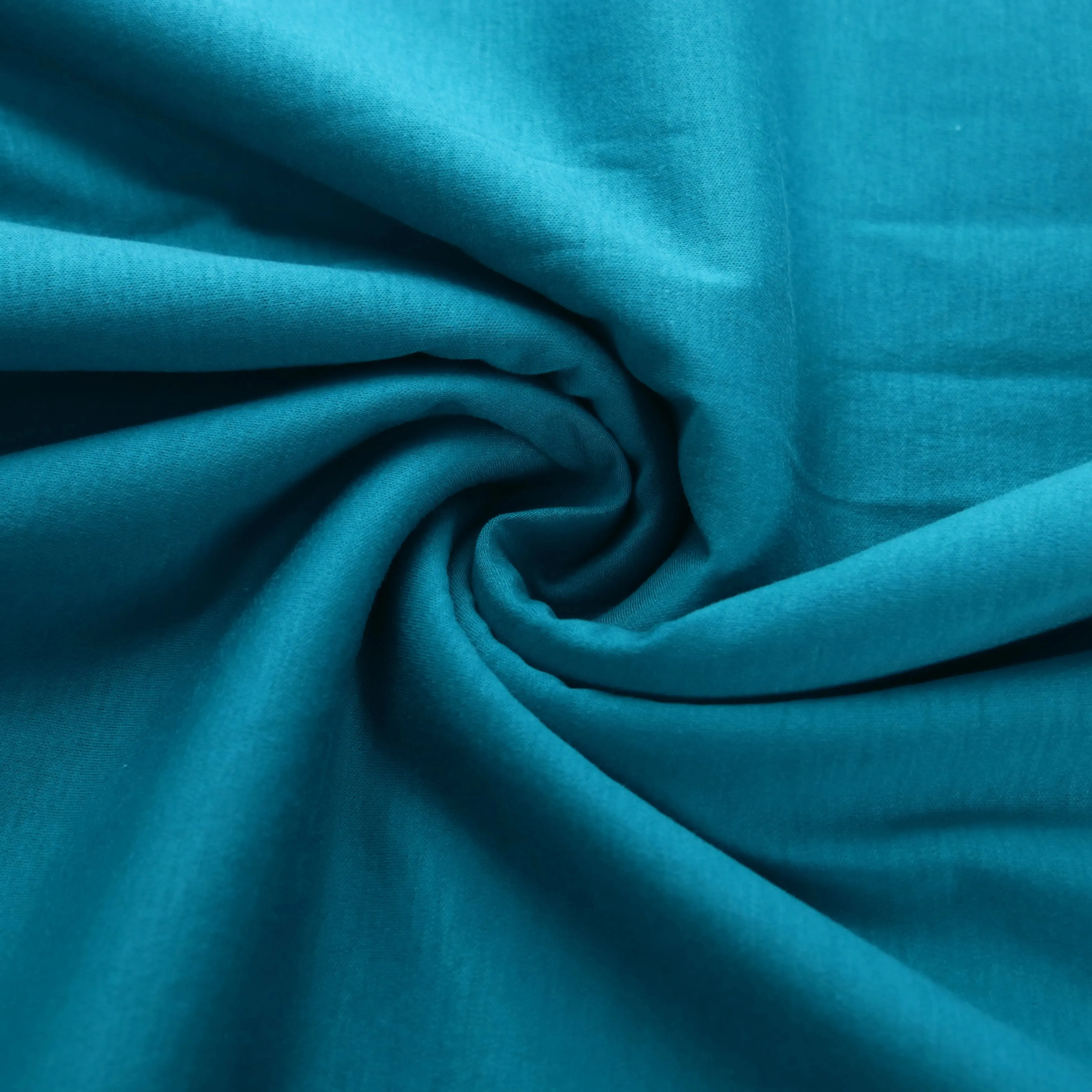 50s 190gsm Personalización 100% algodón mercerizado interlock tejido antibacterias transpirable tela transparente para ropa de verano