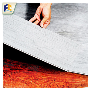 Sang trọng bền lồng vào nhau bê tông ván PVC fishbone hiện đại chống trượt gạch thiết kế Vinyl SPC chống thấm nước chống cháy sàn - Product Image 1