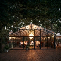 Tente de réception TENTCHO en aluminium et verre, grande structure robuste pour événements et mariages, capacité 200 personnes, tente extérieure en verre