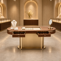 Présentoir à bijoux ovale avec tiroirs intégrés et plateaux en verre encastrés ; Vitrine de présentation de bijoux de luxe de style îlot