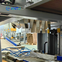 Machine d'emballage de cartons entièrement automatique à chargement par tombée, haute vitesse, pour bouteilles en plastique, canettes et produits de soins personnels