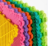 Jifu Carreaux de sol en plastique Nouveaux matériaux colorés Carreaux de sol de garage rose pour pont de course écologique