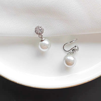Boucles d'oreilles à clipser, pendantes, non percées, avec halo de zircone cubique imitation, plaquées rhodium, pour femme