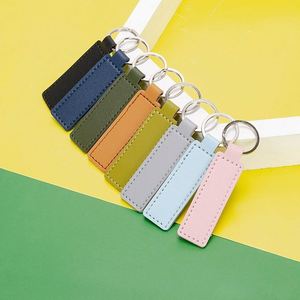 Wholesale Personalized <b>Customized</b> PU Keychain Creative Solid Color Leather Keychain Colorful <b>Key</b> <b>Rings</b> - Product Image 1