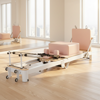 Machine de Pilates Reformer Pliable Personnalisable pour Studio, en Aluminium Blanc et Noir, Reformer Commercial Pliant, Lit de Pilates pour le Renforcement du Tronc