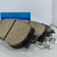 Nouvelles plaquettes de frein arrière semi-métalliques en céramique Frontech OEM en gros pour Navara D40/D23 Pickup 2010-2021 pour Audi Benz