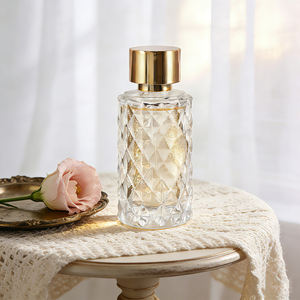 Elegantes y Exclusivos Frascos de Perfume de Vidrio Transparente de 80 ml, Cilíndricos, Vacíos, con Pulverizador - Product Image 1