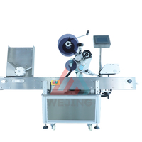 Machine d'étiquetage électrique horizontale automatique pour ampoules, bouteilles, métal, PLC, boîte de vitesses à engrenages, précision de 1 mm, vitesse de 0 à 25 m/min