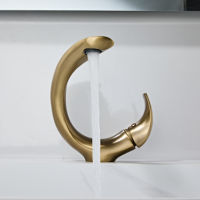 Robinet de lavabo de salle de bain créatif en or brossé de haute qualité, design à poignée unique, mitigeur durable avec cartouche céramique chaud/froid