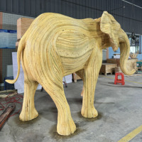 Accessoires de présentation de fenêtre sur le thème des animaux de décoration d'éléphant en rotin d'artisanat personnalisé