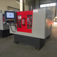 Máquina cortadora de llanta de rueda de aleación CNC Estructura de torno de cama plana de rueda de corte de diamante de un solo husillo automático resistente